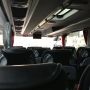 In een privé-bus naar Lelystad. 