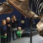 My kids with my mom at the T-rex exhibition... check the two year old on the right #cantstoplaughing