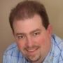 Shoot, sorry for the delay. Title should be "Senior IT Architect, IBM Interactive" Here's a photo — will send a bio